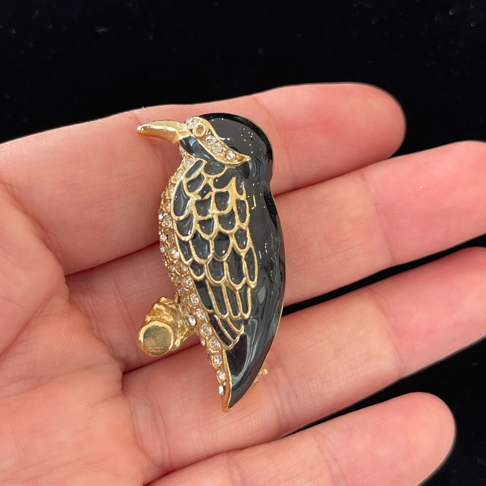 Elegant Black and Gold Bird Brooch